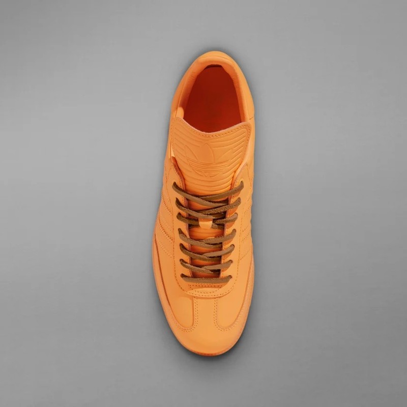 Human race shoes orange online
